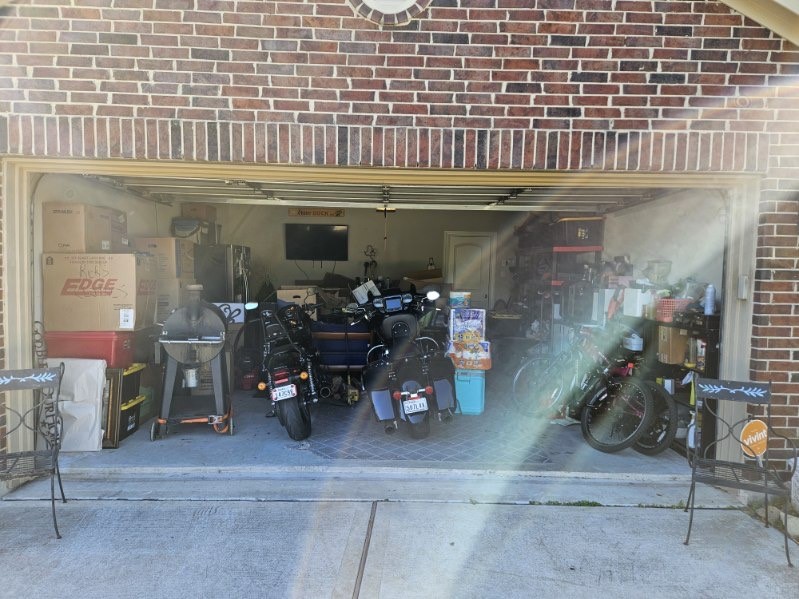 5710 Micah Lane Rosenberg, TX 77471 - Photo 33 of 36 Spacious garage with brick walls and room for parking and storage.