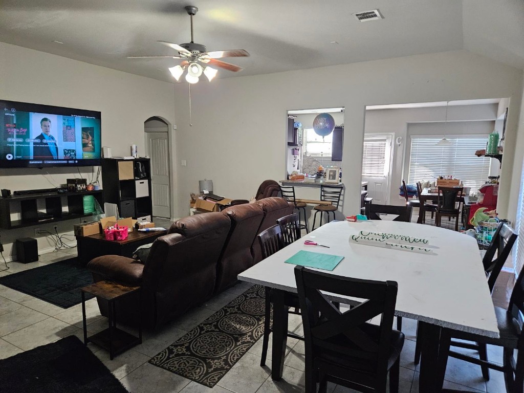 5710 Micah Lane Rosenberg, TX 77471 - Photo 5 of 36 Wide-angle view of the main living area, highlighting the seamless flow between the lounge and dining spaces.
