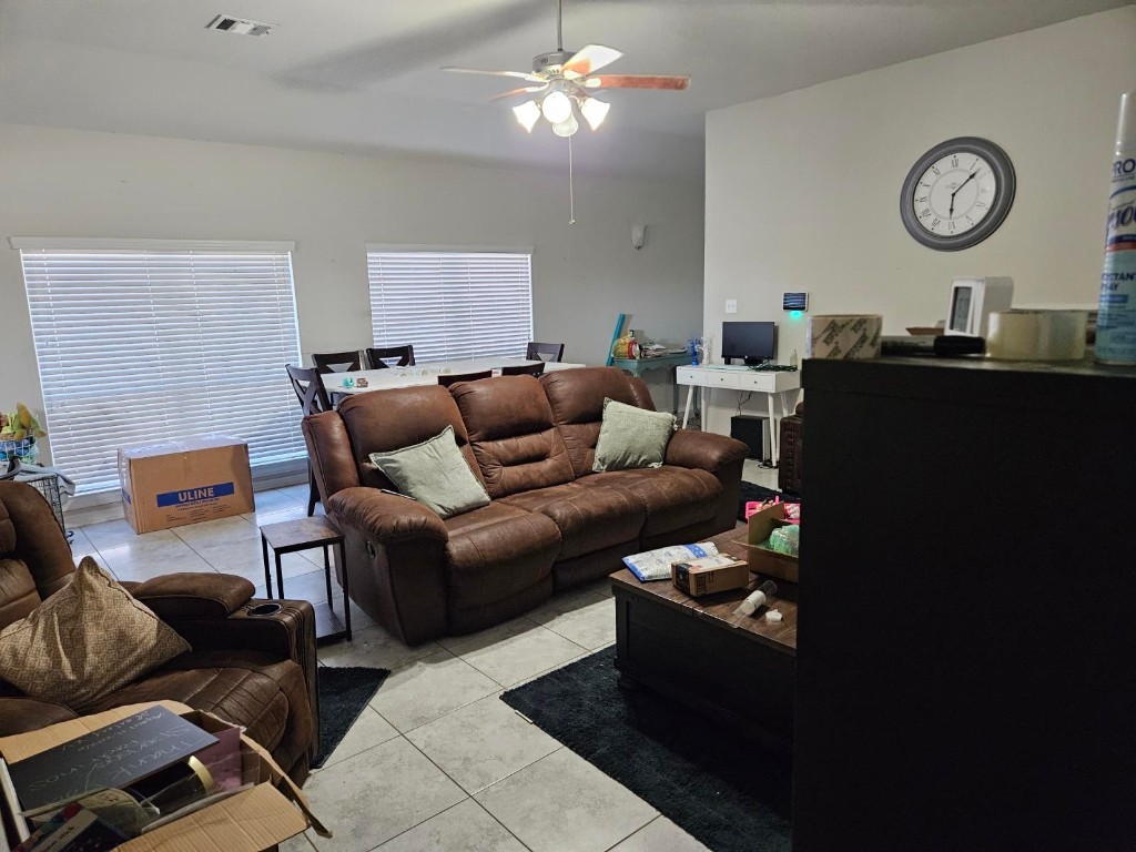 5710 Micah Lane Rosenberg, TX 77471 - Photo 8 of 36 Alternative view of the living room showing the ample floor space and bright, airy atmosphere.