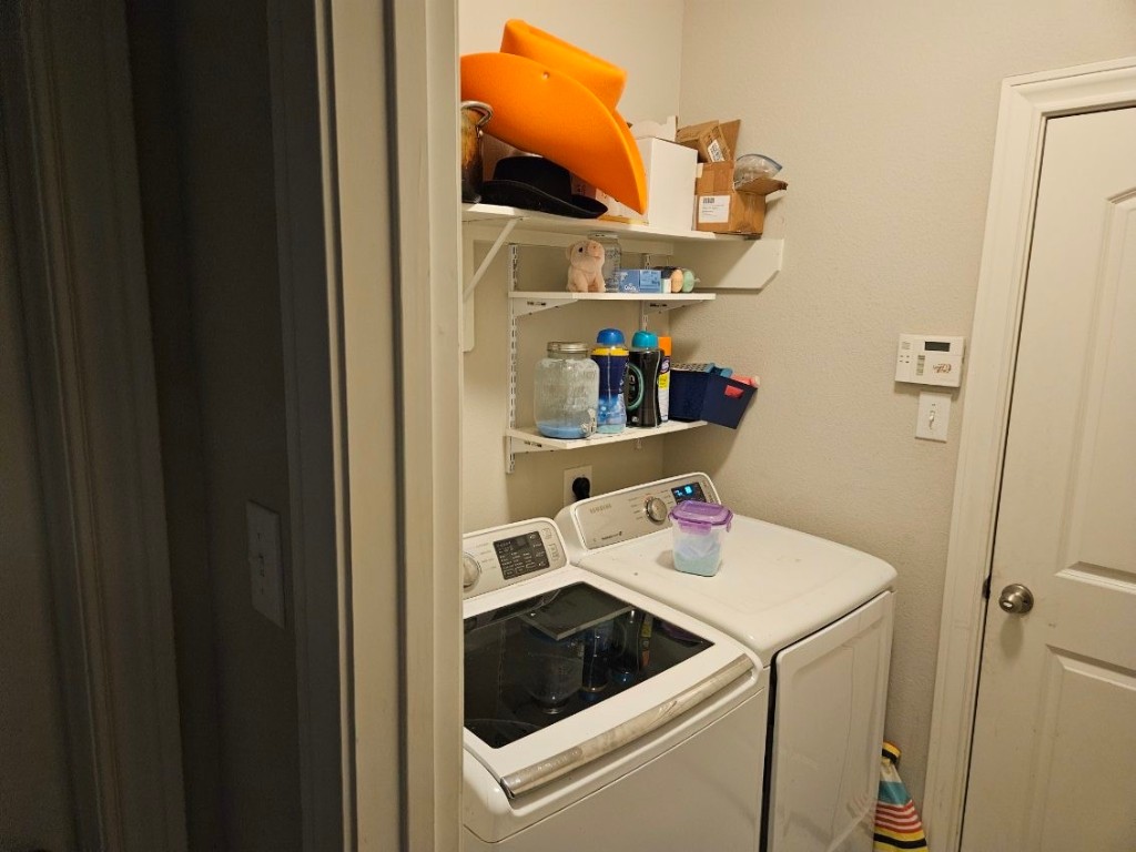 5710 Micah Lane Rosenberg, TX 77471 - Photo 10 of 36 Small bathroom with vanity, mirror, and wall shelving for storage.