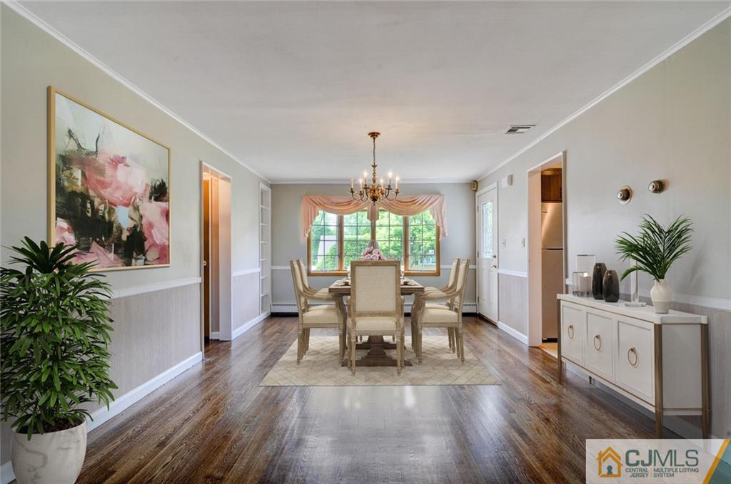 87 West Hill Road Colonia, NJ 07067 - Photo 18 of 18 a living room with furniture and a large window
