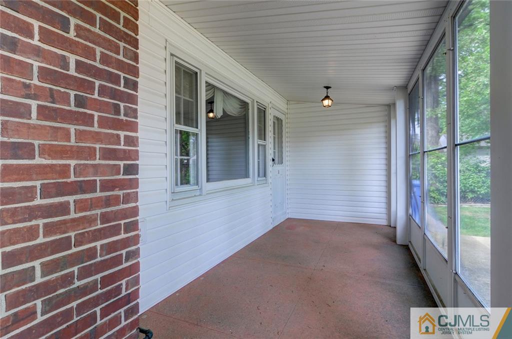 87 West Hill Road Colonia, NJ 07067 - Photo 6 of 18 a view of an empty room with a window