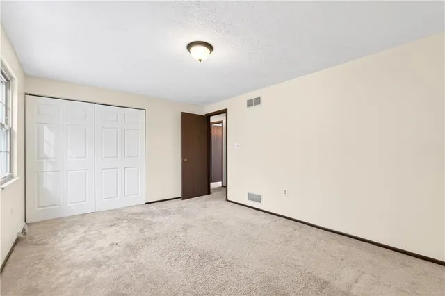 an empty room with an entryway