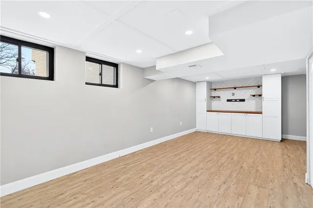 a view of a kitchen with a dishwasher and a refrigerator