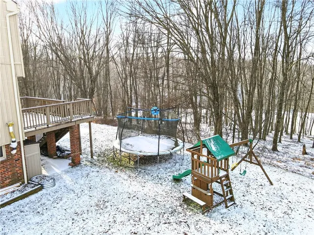 a view of a terrace with couches and table