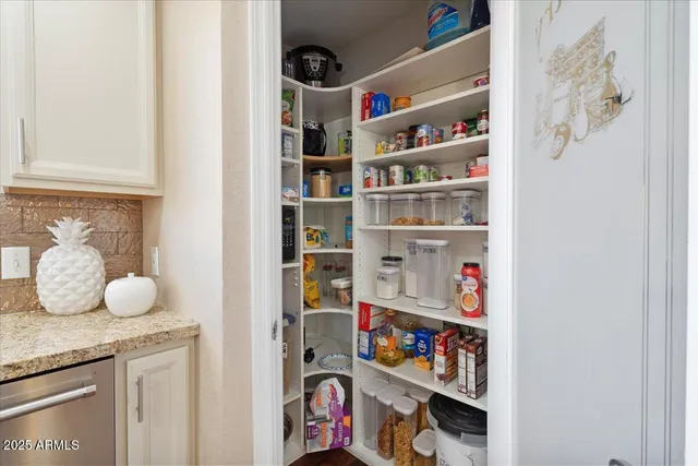 a view of a workspace with furniture