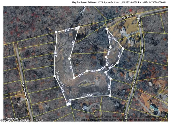 a bathroom with a toilet and a mirror