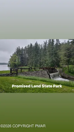 a view of gym with a table and chairs