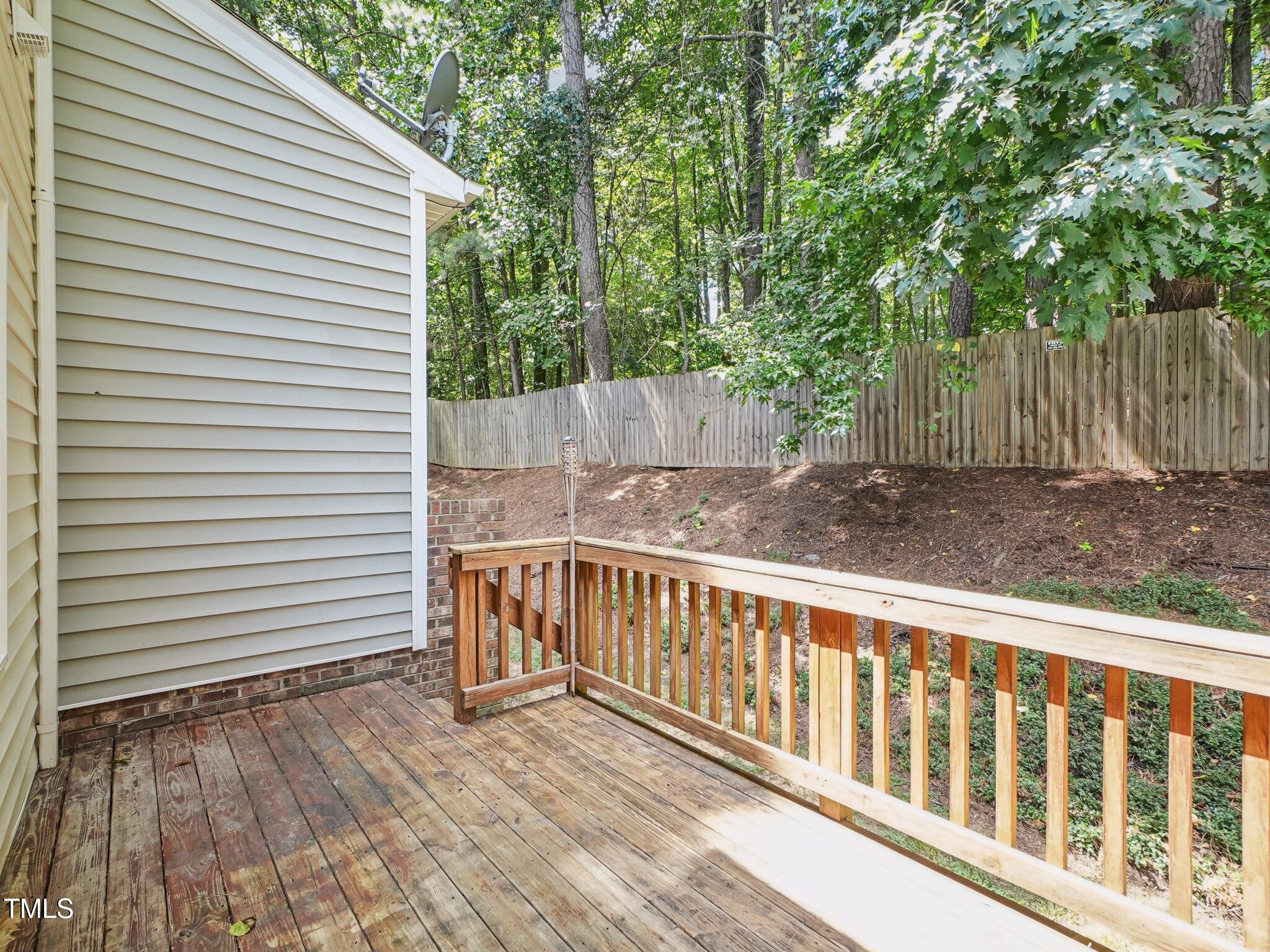 2228 Trailwood Valley Circle Raleigh, NC 27603 - Photo 17 of 19 a view of a wooden fence