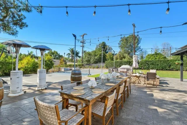a dining area with furniture and outdoor view