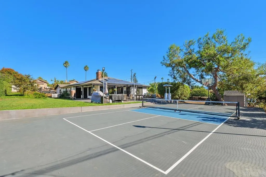 2625 Havencrest Drive Fallbrook, CA 92028 - Photo 22 of 35 a view of a tennis ground with large trees