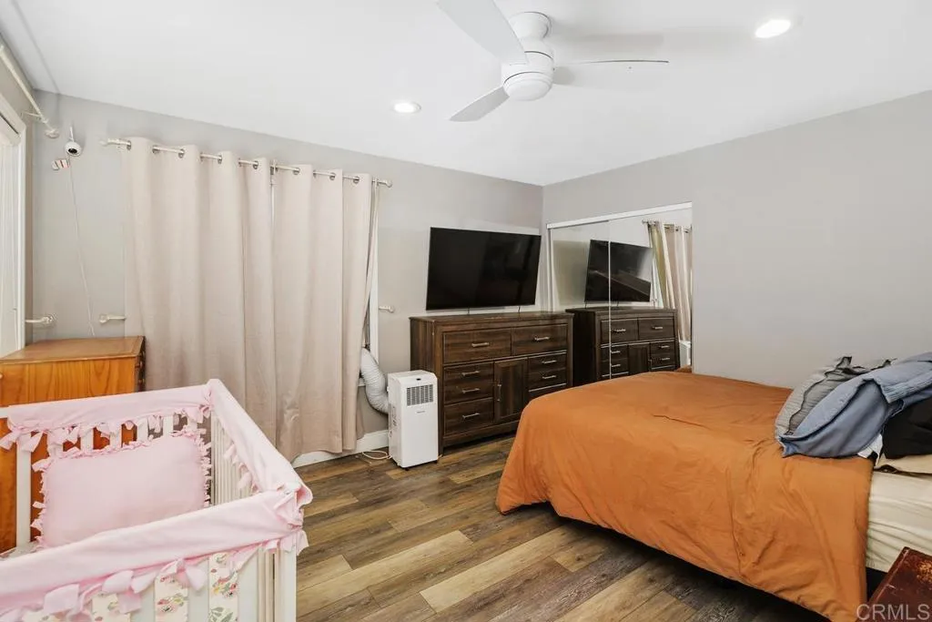 2625 Havencrest Drive Fallbrook, CA 92028 - Photo 30 of 35 a bedroom with a bed and a flat screen tv