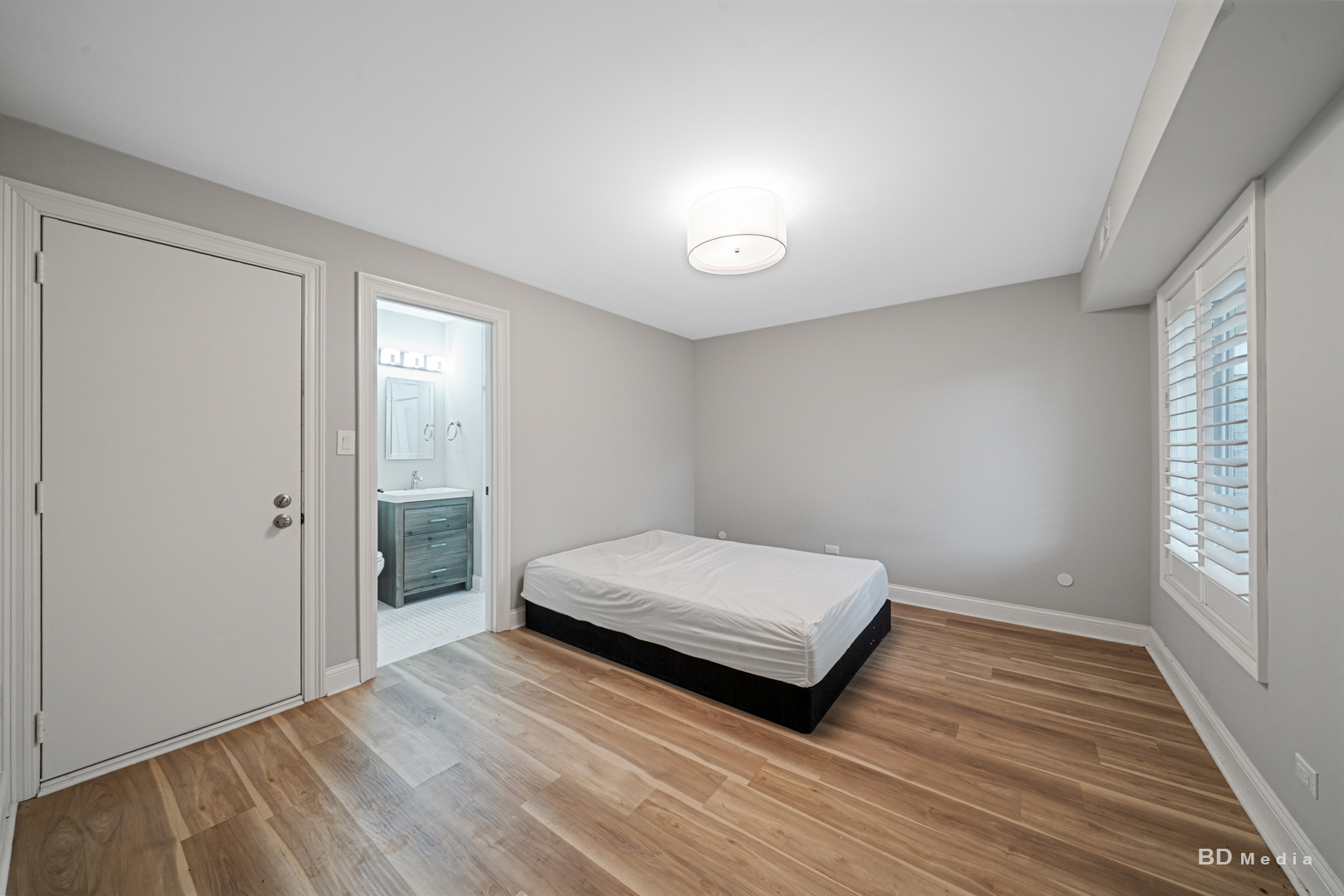 15717 Orlan Brook Drive, Unit G83 Orland Park, IL 60462 - Photo 16 of 21 a bedroom with a bed and window