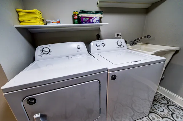 a utility room with dryer and washer