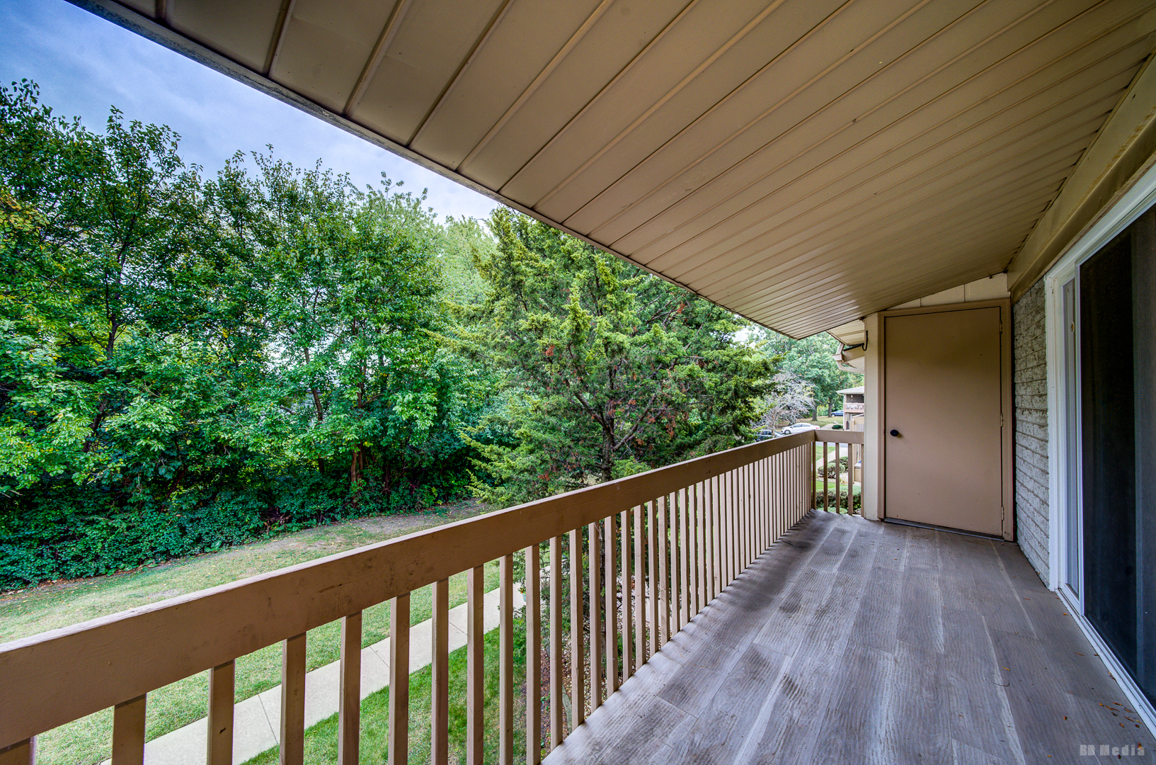 15717 Orlan Brook Drive, Unit G83 Orland Park, IL 60462 - Photo 19 of 21 a view of balcony with wooden floor