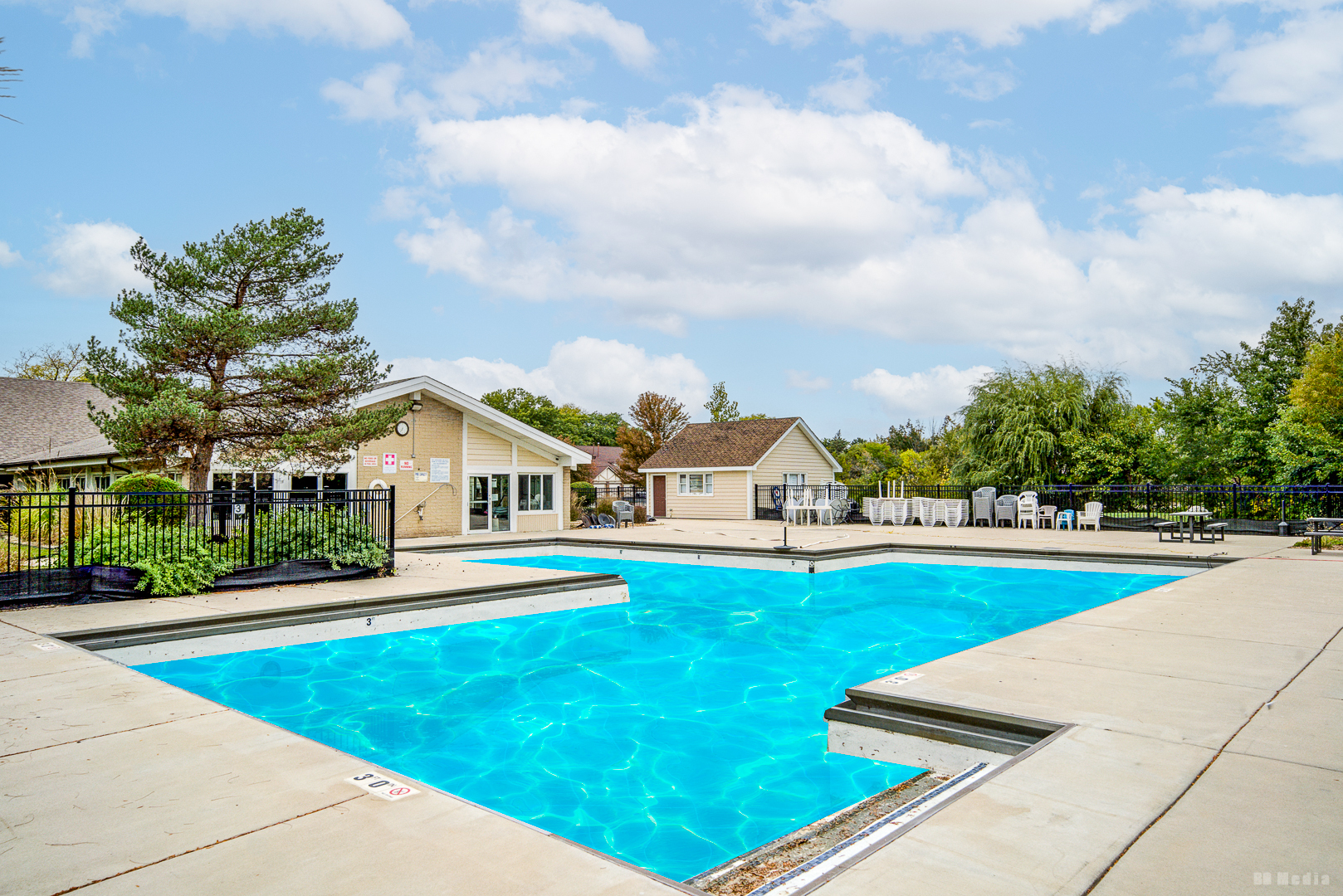 15717 Orlan Brook Drive, Unit G83 Orland Park, IL 60462 - Photo 20 of 21 a view of an house with swimming pool and yard