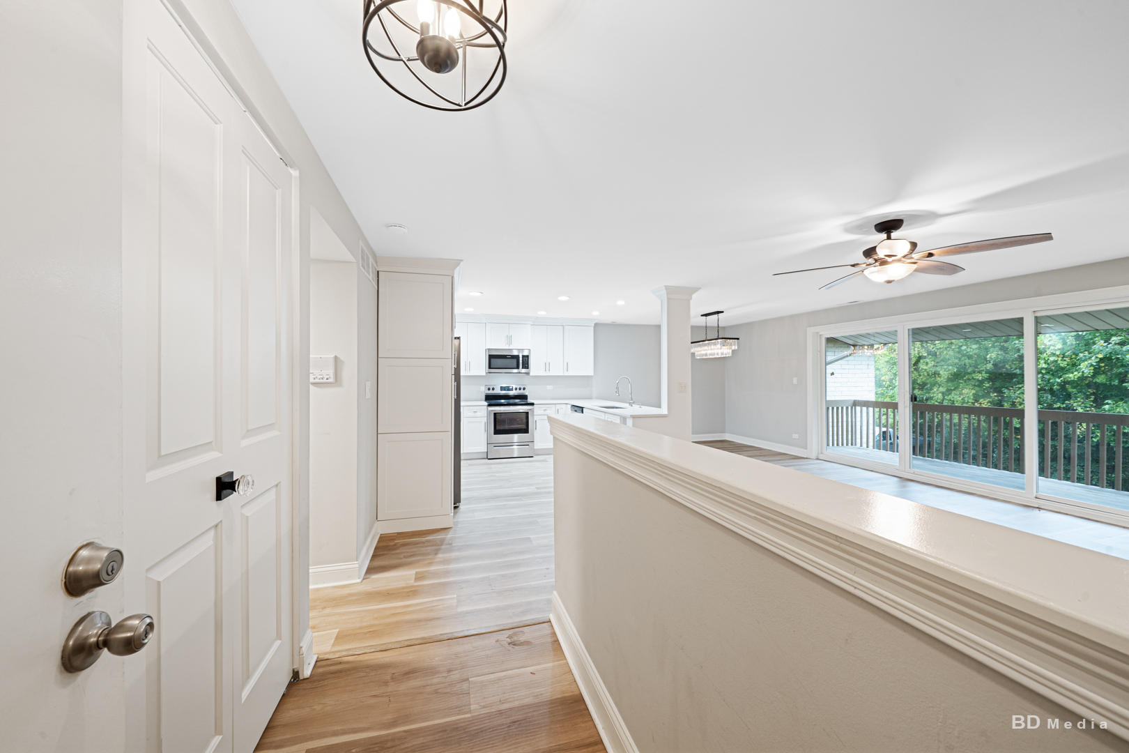 15717 Orlan Brook Drive, Unit G83 Orland Park, IL 60462 - Photo 4 of 21 a very nice looking room with a large window and chandelier