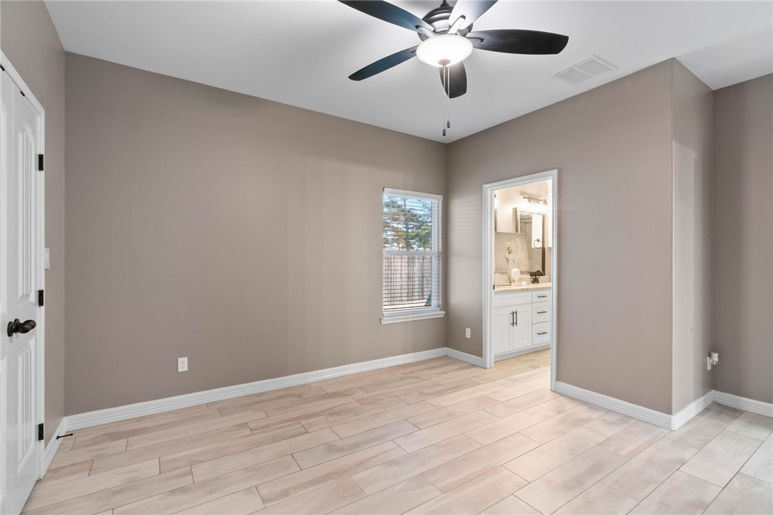 401 Big Shell Court Corpus Christi, TX 78418 - Photo 19 of 26 an empty room with closet and windows