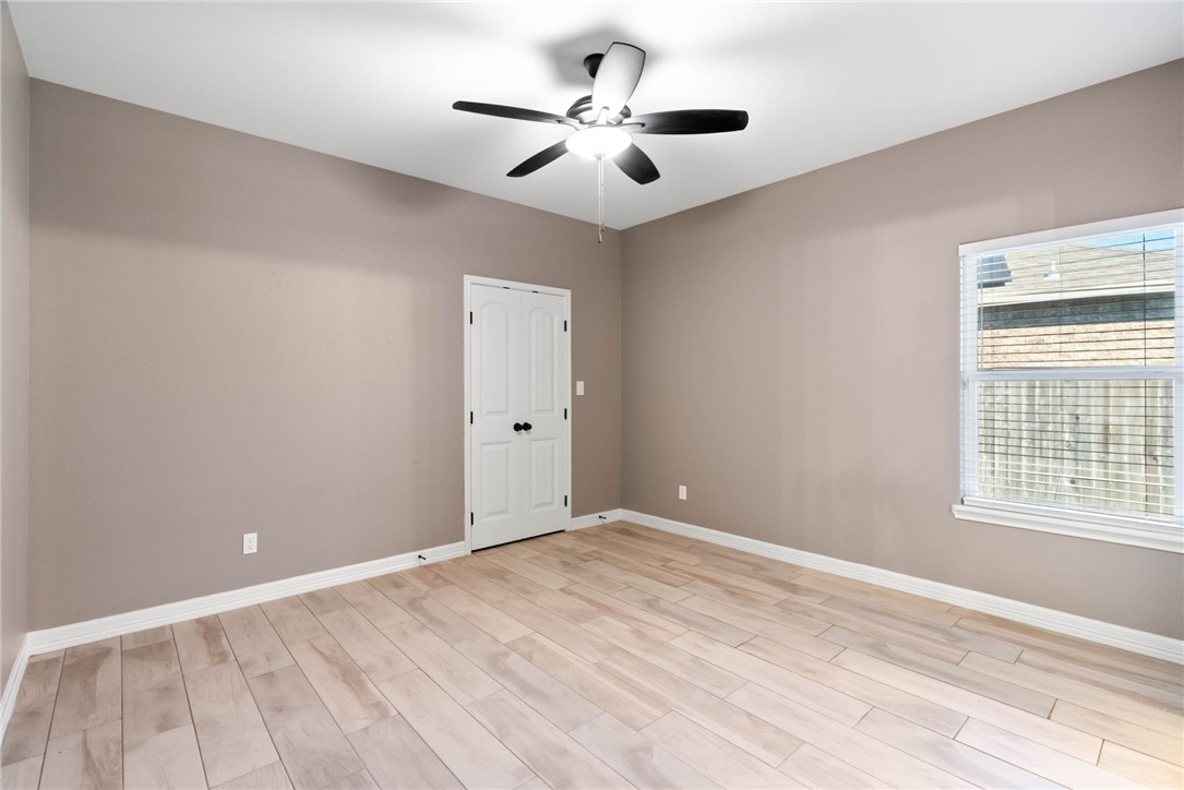 401 Big Shell Court Corpus Christi, TX 78418 - Photo 20 of 26 a view of an empty room with a window
