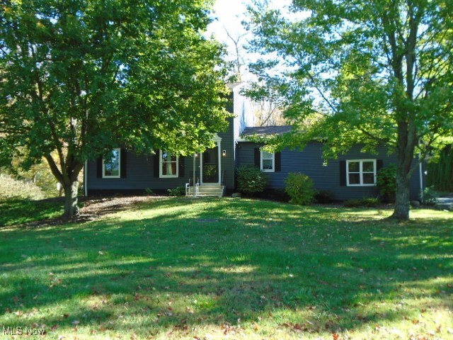 10971 Auburn Road Chardon, OH 44024 - Photo 33 of 40 View of front of house with a front lawn