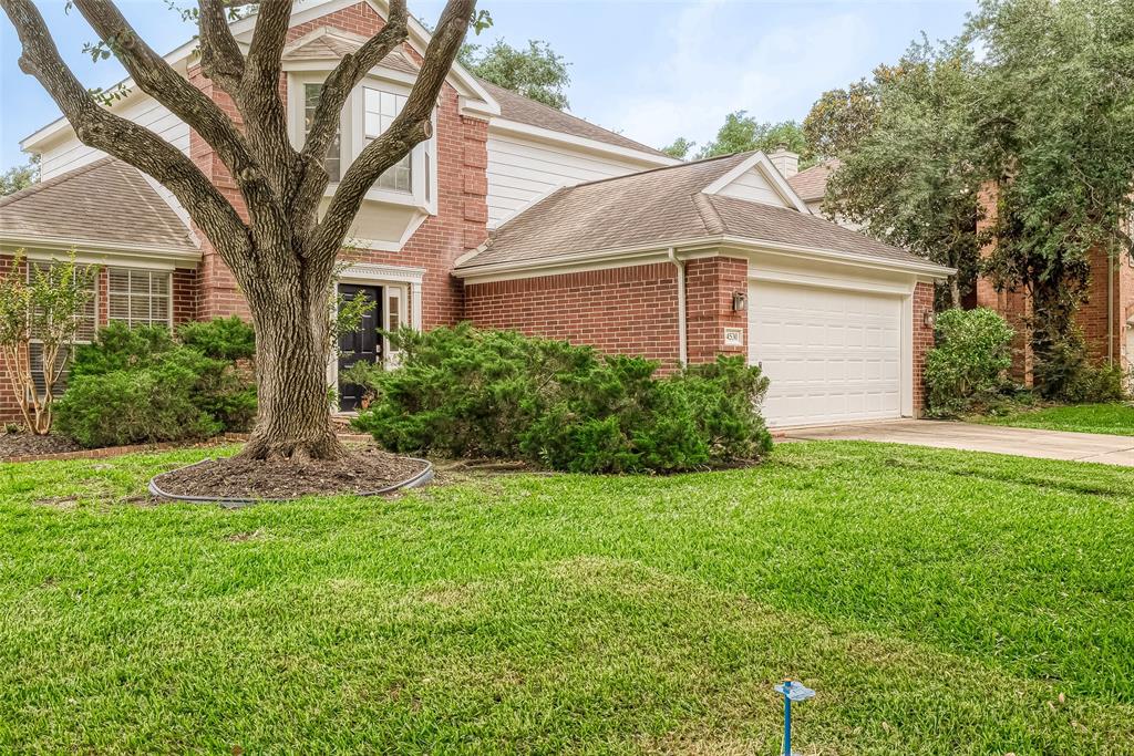 Large corner lot has mature trees and plenty of front yard to play in.