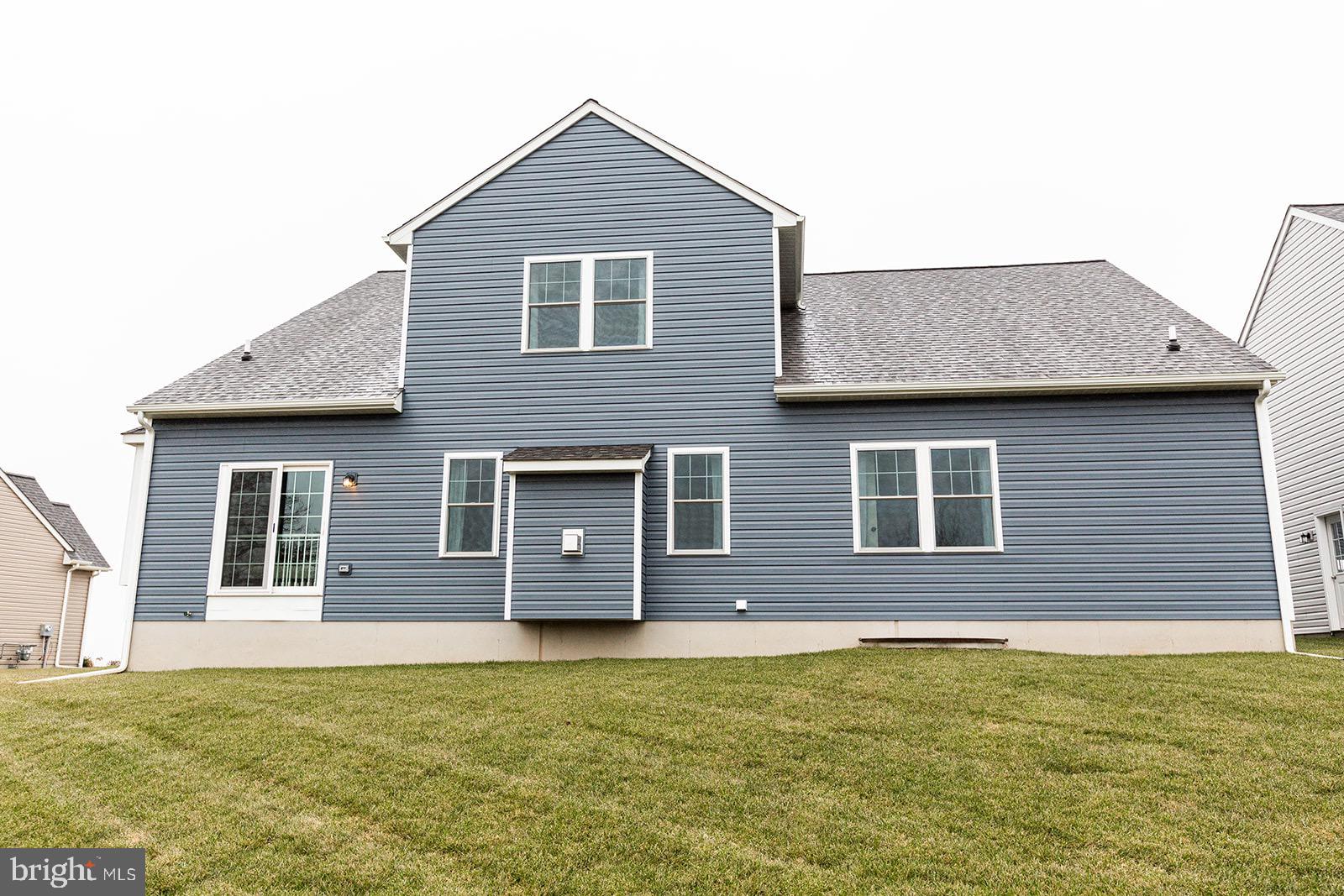 Greenwood Drive #f Greenwood Drive, Unit F Oxford, PA 19363 - Photo 109 of 110 a front view of a house with a garden