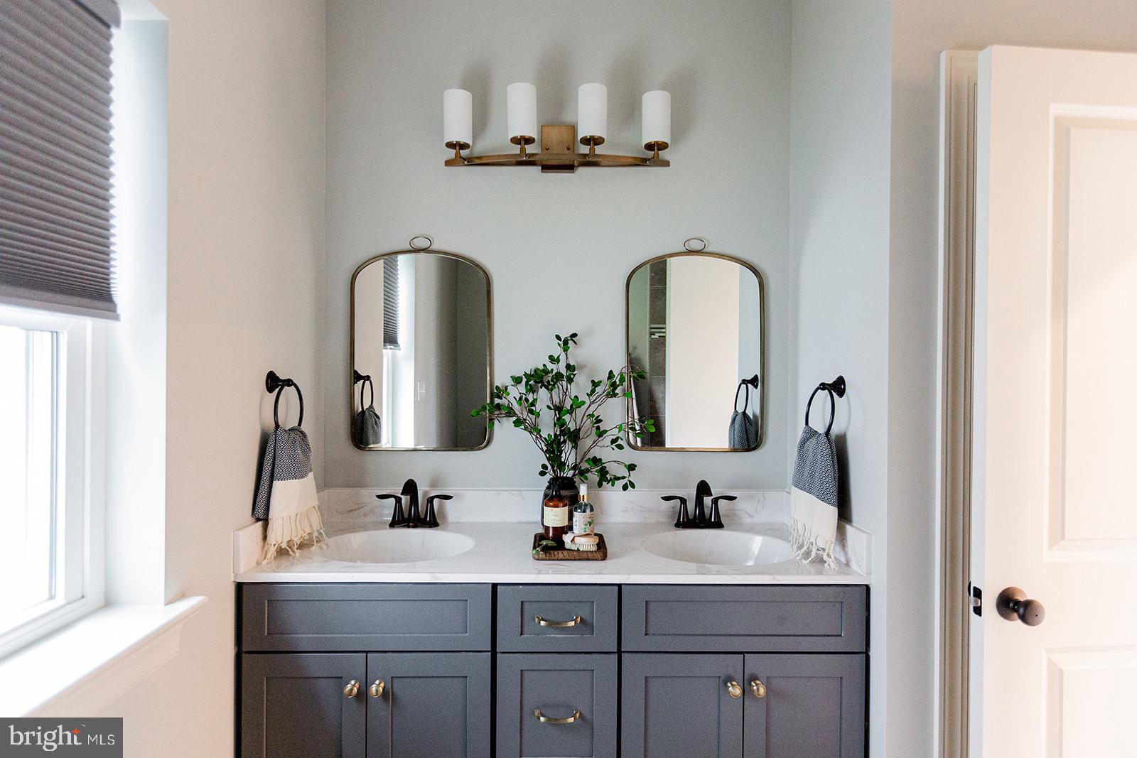 Greenwood Drive #f Greenwood Drive, Unit F Oxford, PA 19363 - Photo 45 of 110 a bathroom with double vanity sinks and a mirror