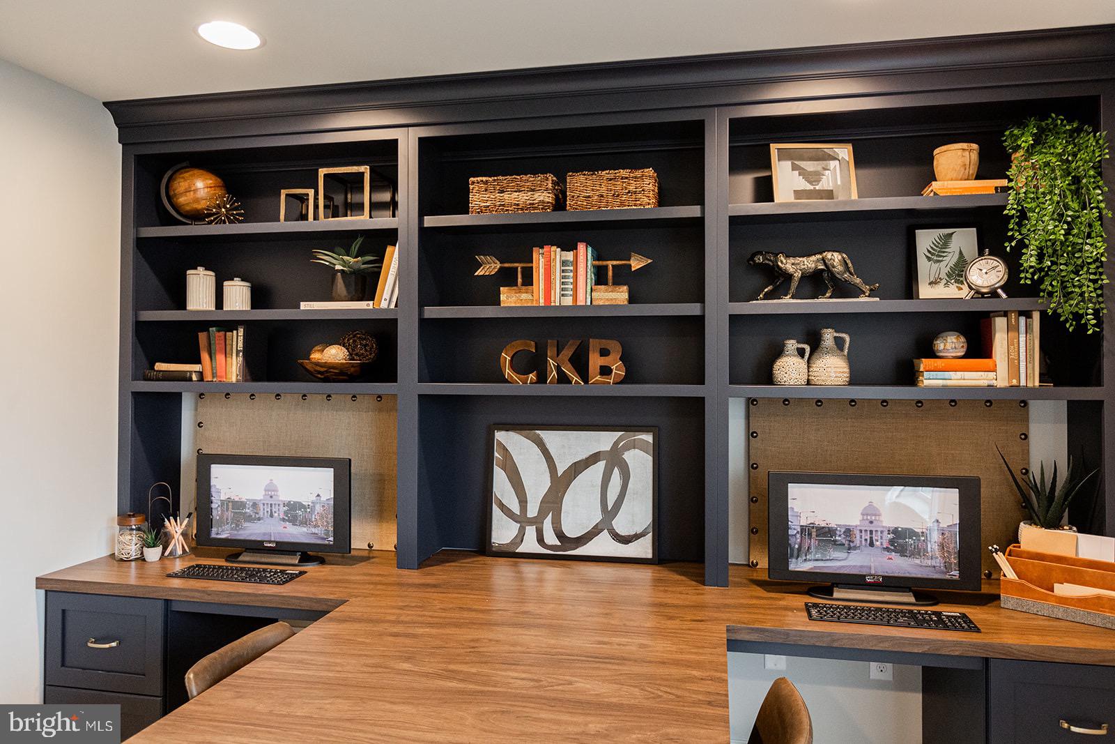 Greenwood Drive #f Greenwood Drive, Unit F Oxford, PA 19363 - Photo 62 of 110 a living room with bookshelf and a fireplace