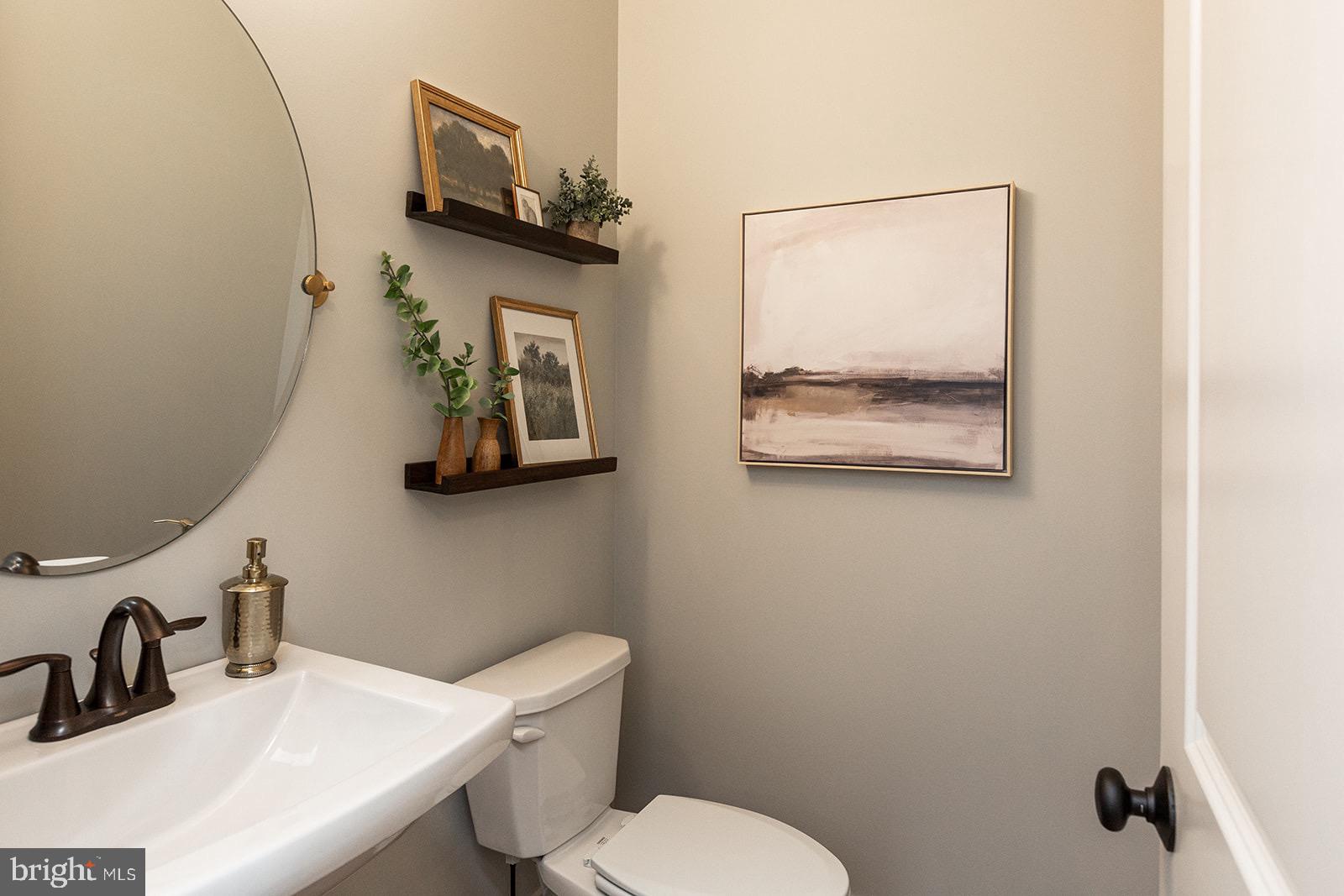 Greenwood Drive #f Greenwood Drive, Unit F Oxford, PA 19363 - Photo 77 of 110 a bathroom with a toilet sink and mirror
