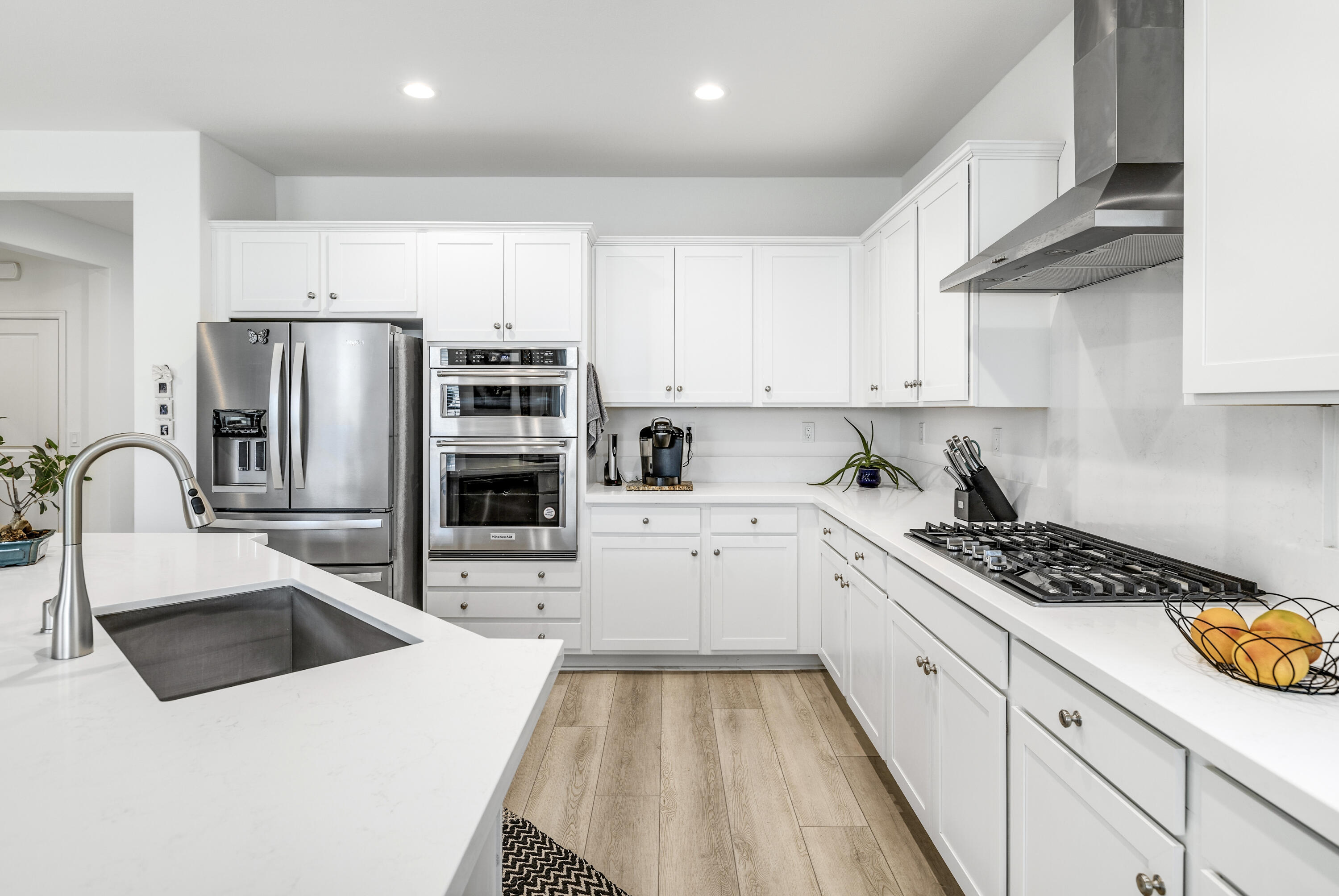 78804 Santa Rosa Way Palm Desert, CA 92211 - Photo 14 of 40 a kitchen with stainless steel appliances a refrigerator sink and cabinets