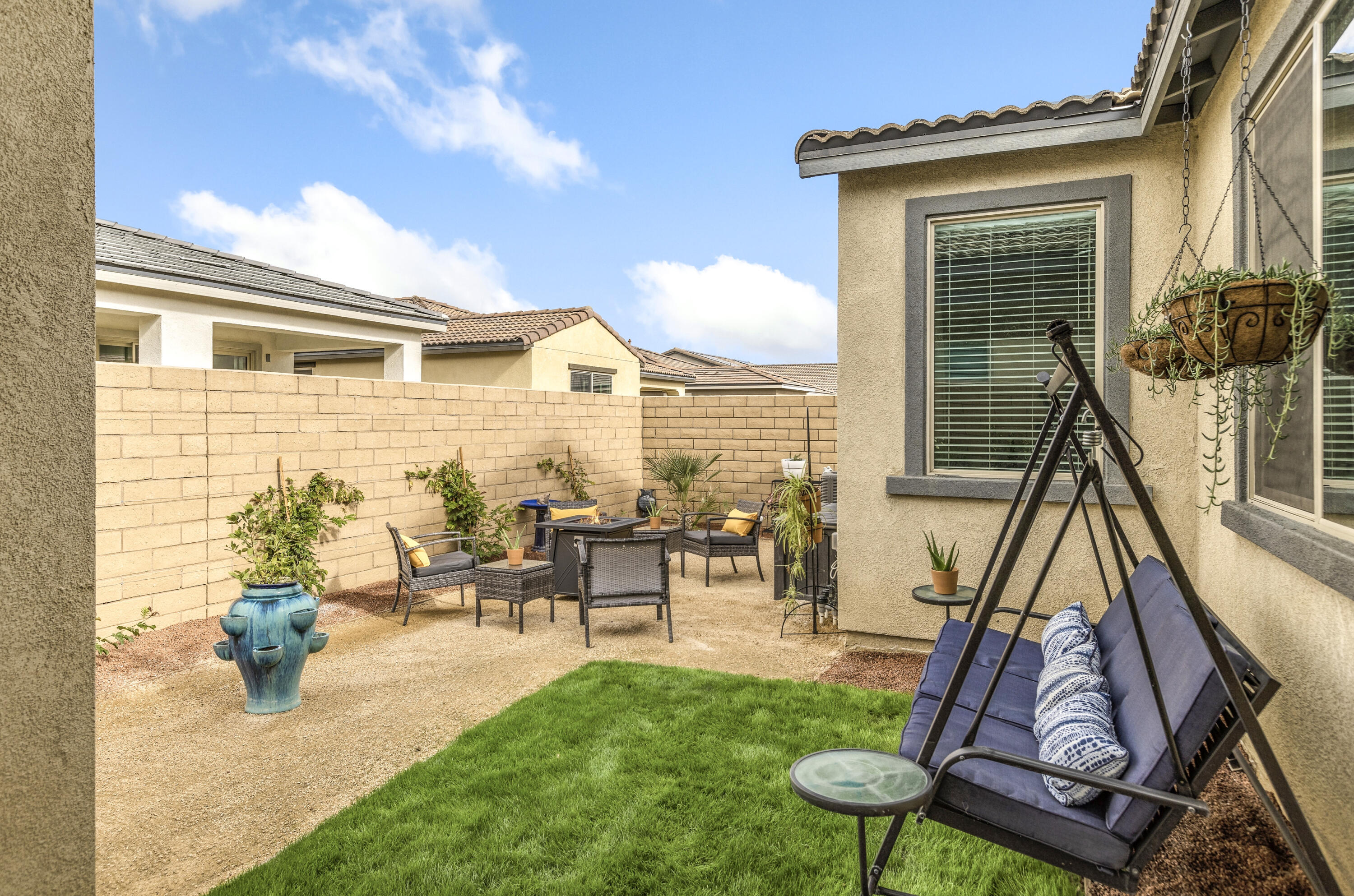 78804 Santa Rosa Way Palm Desert, CA 92211 - Photo 31 of 40 a view of a house with backyard porch and sitting area