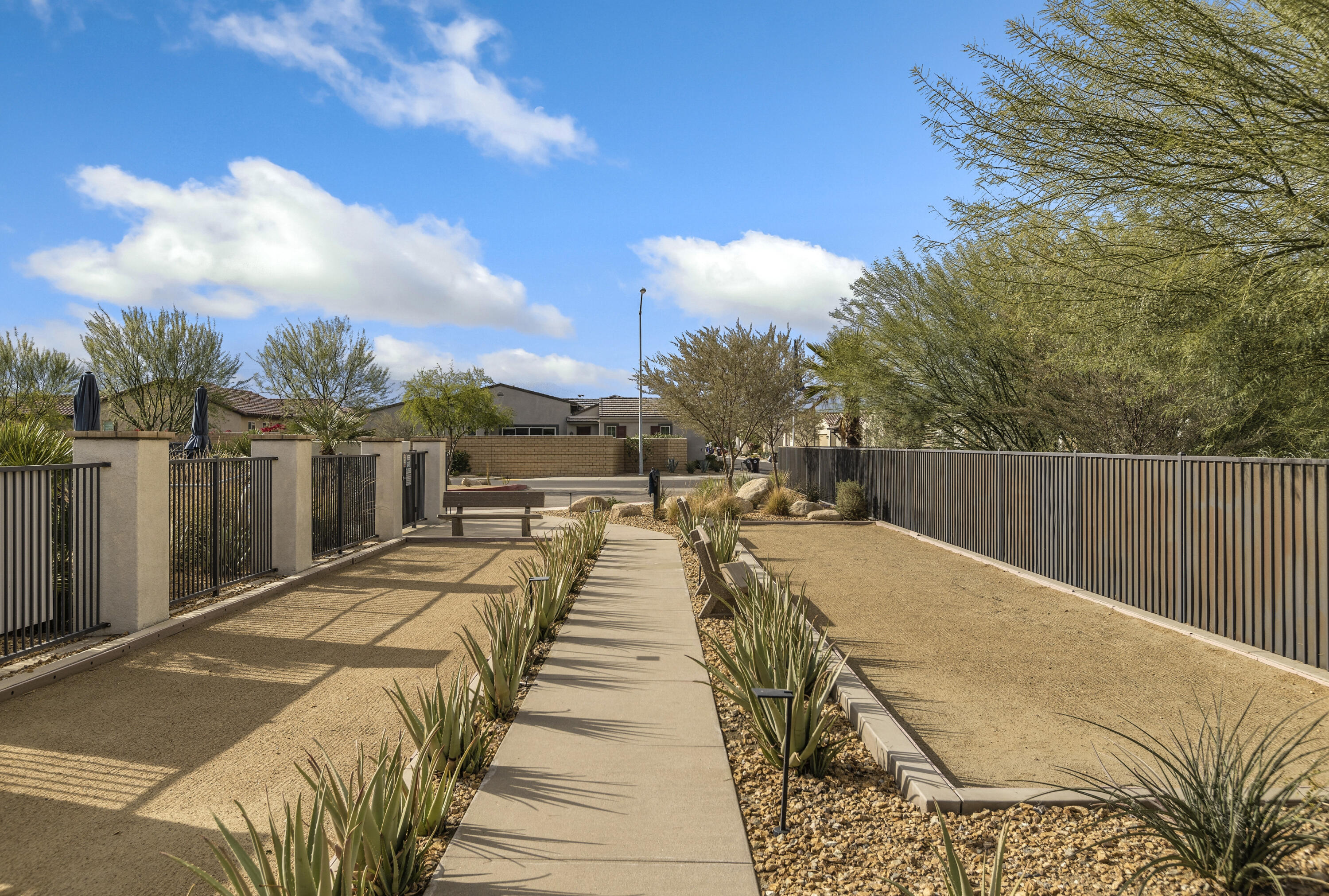 78804 Santa Rosa Way Palm Desert, CA 92211 - Photo 38 of 40 a view of a swimming pool with a patio