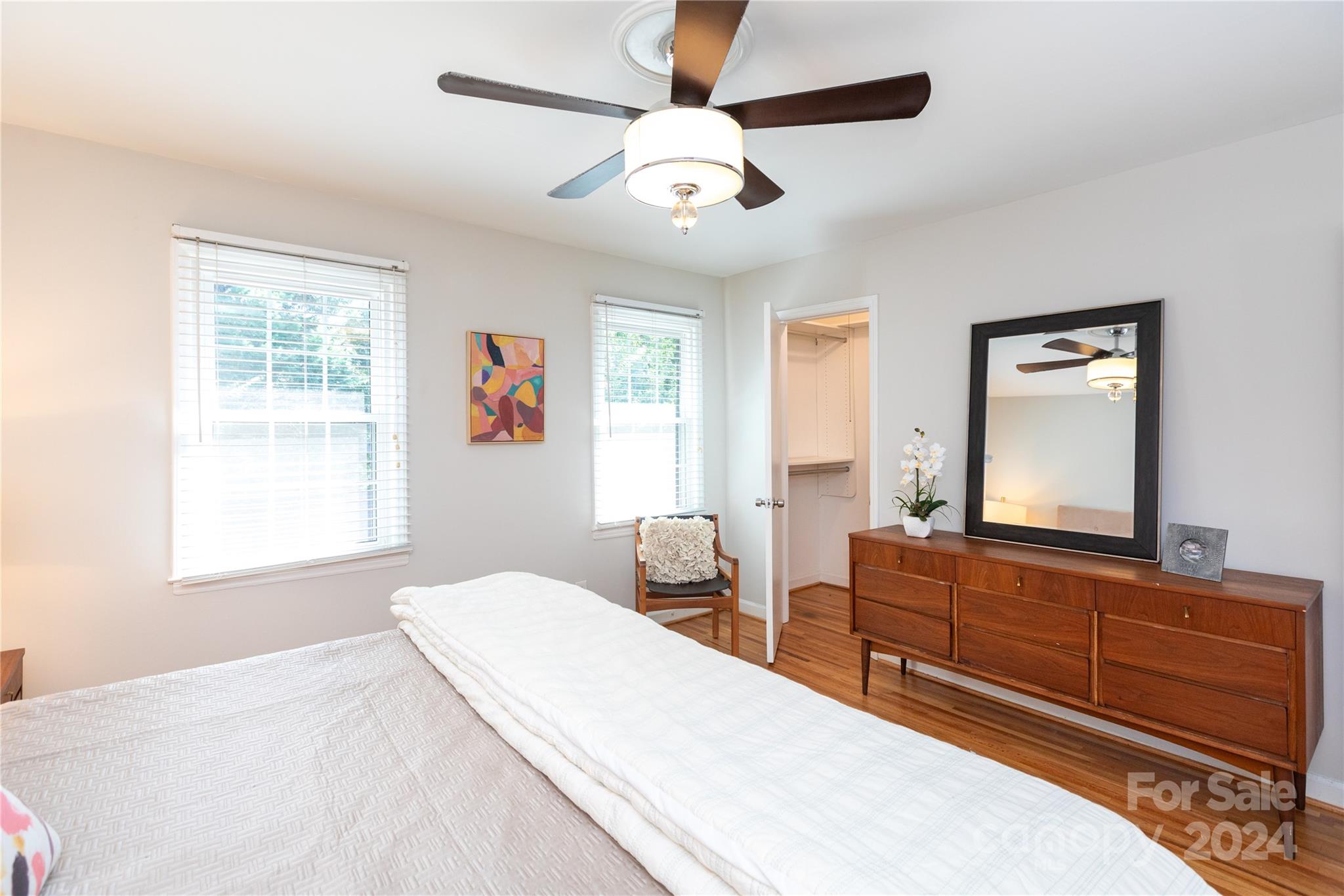 856 McAlway Road, Unit B Charlotte, NC 28211 - Photo 15 of 25 a bedroom with a large bed and a window
