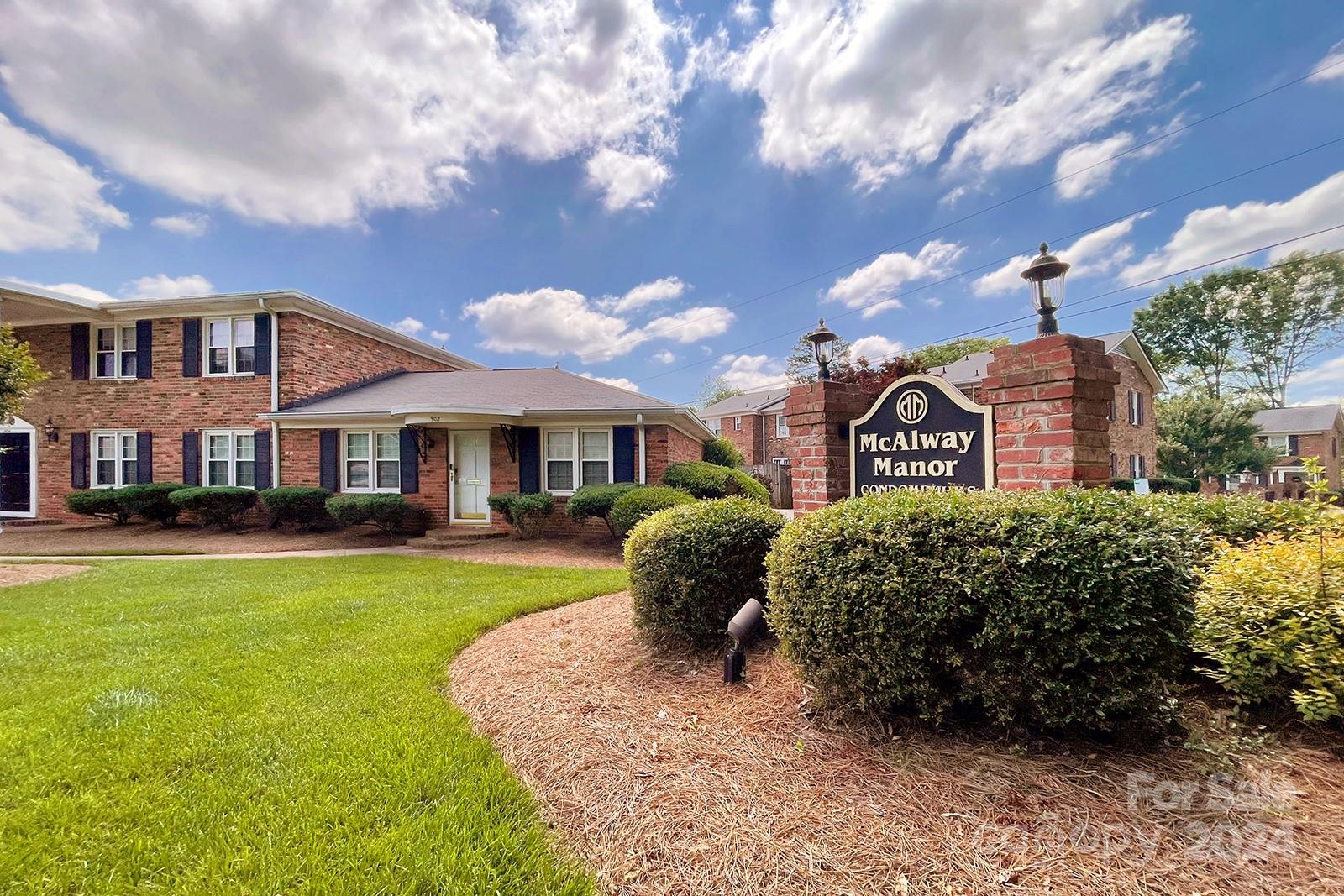 856 McAlway Road, Unit B Charlotte, NC 28211 - Photo 25 of 25 a front view of a house with a garden