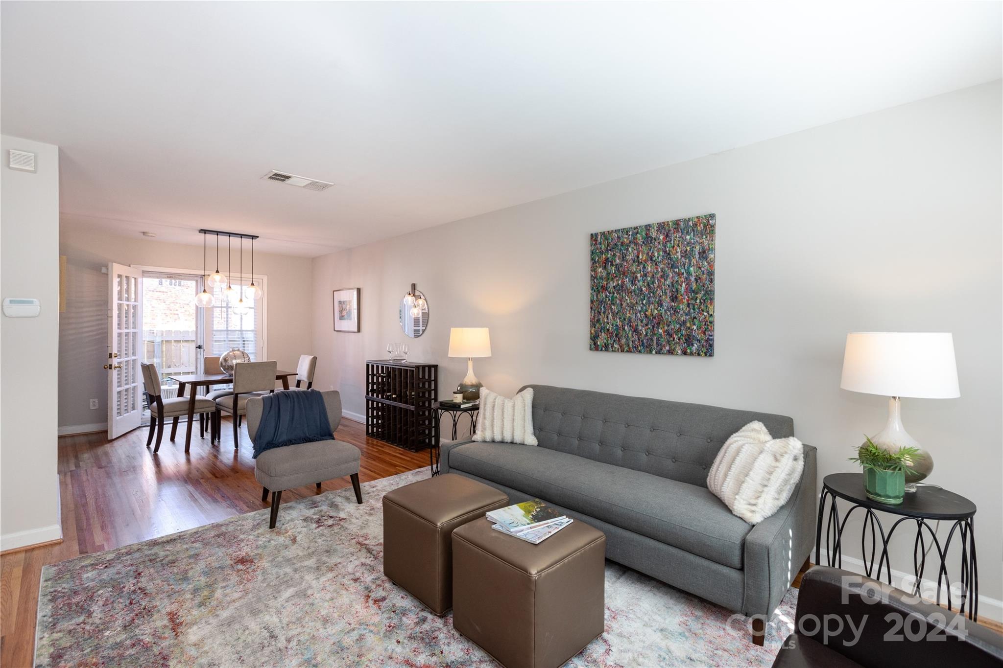 856 McAlway Road, Unit B Charlotte, NC 28211 - Photo 4 of 25 a living room with furniture and wooden floor