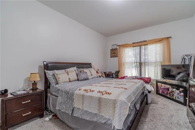 a view of staircase with large window