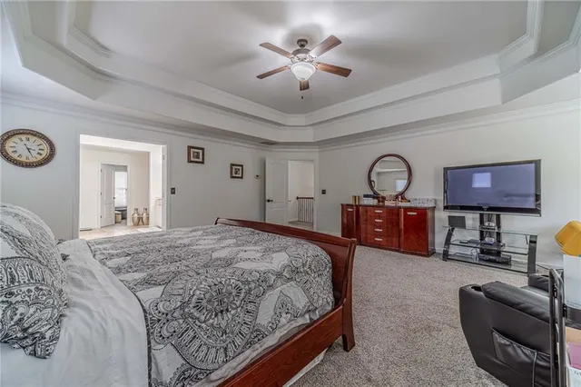 a view of a swimming pool with an outdoor space and seating area