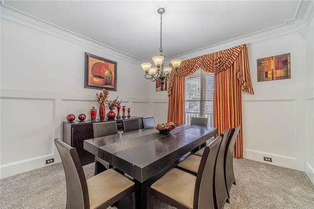 a view of a livingroom with furniture and hardwood floor