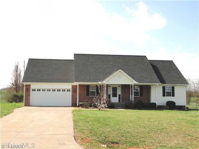 169 Greenfield Road Mocksville, NC 27028 - Photo 1 of 16 Exterior Front. A low maintenance brick and vinyl exterior. And just 1 mile from Mila Equestrian Center, a 50 acre private facility offering horse boarding & training.