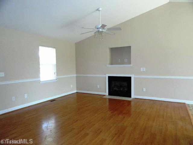 169 Greenfield Road Mocksville, NC 27028 - Photo 3 of 16 Living Room. Living Room: Gleaming laminate wood floors, ceiling fans and vaulted ceilings.