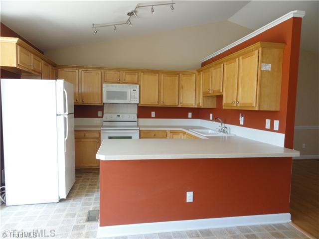 169 Greenfield Road Mocksville, NC 27028 - Photo 5 of 16 Kitchen. Kitchen with lots of cabinet space and a dining peninsula.