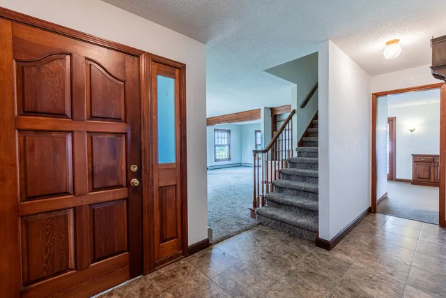 an entryway with a hallway