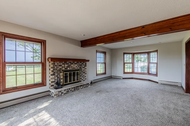 a view of a livingroom with a fireplace