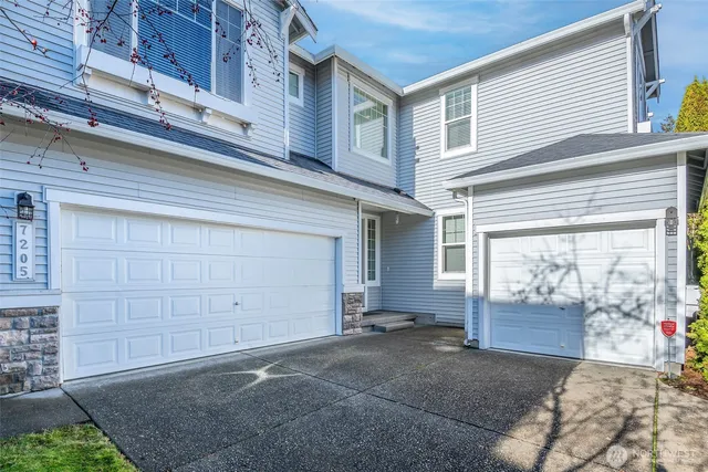 a view of a house with garage