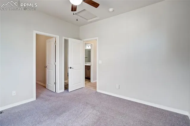 an empty room with a bathroom