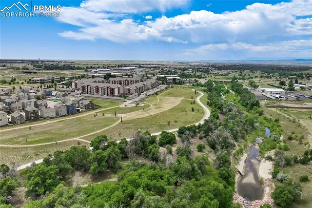 a view of a lake with a city