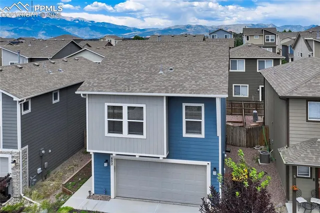 front view of a house with a street