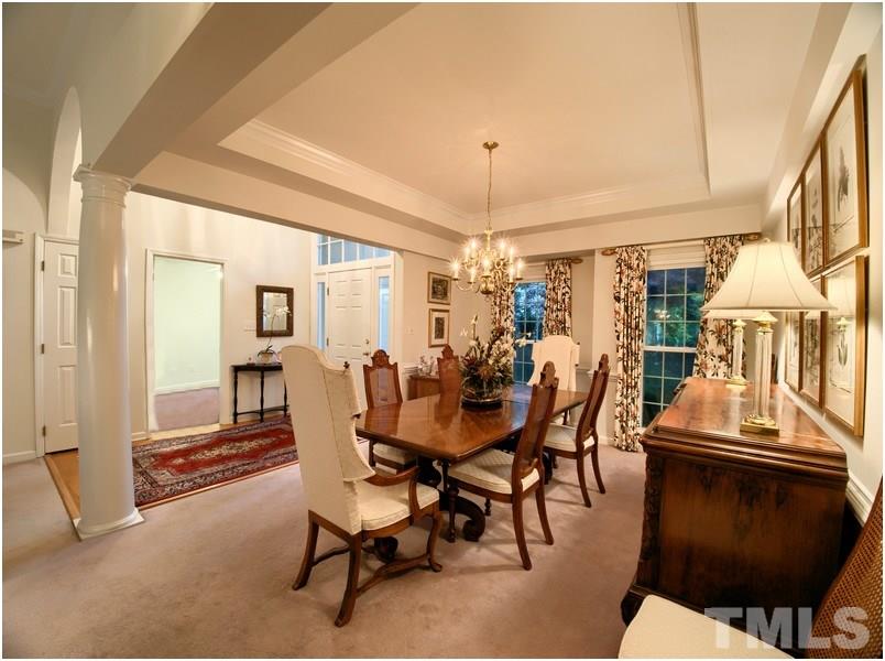 Open dining room with easy access to kitchen, living room and foyer.