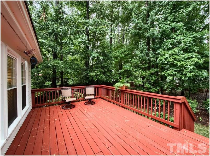 8501 Bluebill Court Raleigh, NC 27615 - Photo 25 of 25 Large deck at the rear of the home overlooks a lovely, private, landscaped back yard.