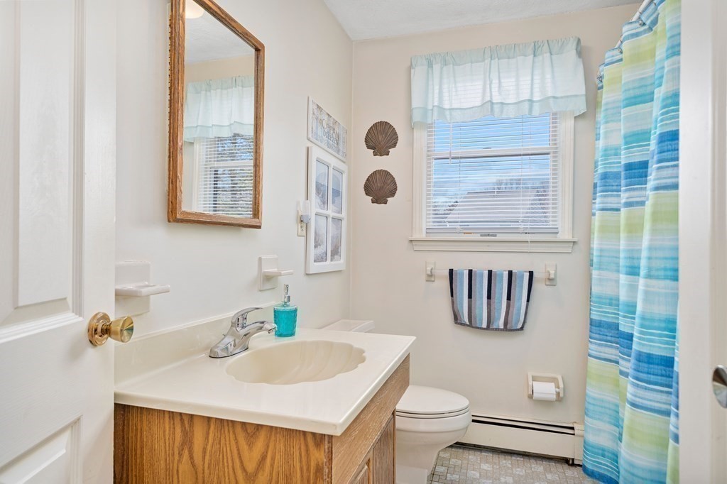 160 Winchester Road Arlington, MA 02474 - Photo 19 of 33 a bathroom with a sink toilet and shower